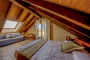 First-floor bedroom with sloping ceilings. Mind your head